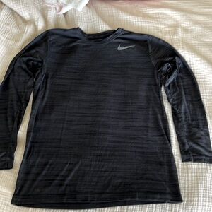 Nike Men’s long sleeve Dri-Fit training top. Size large. Black.